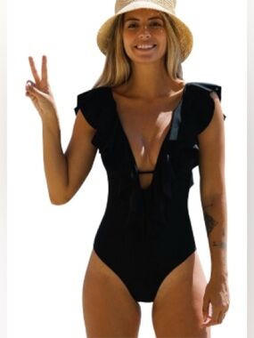 NWT-Small Black Ruffle
Deep V-Neck adjustable tie back
Classic bathing suit